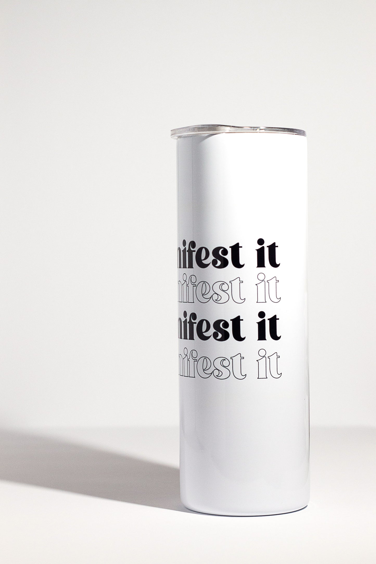 20oz double insulated tumbler with manifest it written on it